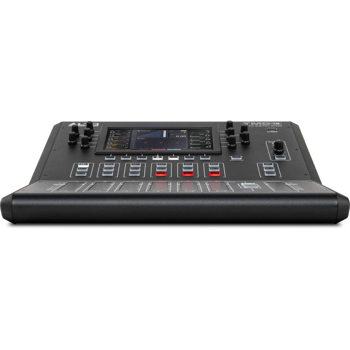 Alto Professional TMD16 digital mixer with multiple input channels and control knobs, set on a studio table.