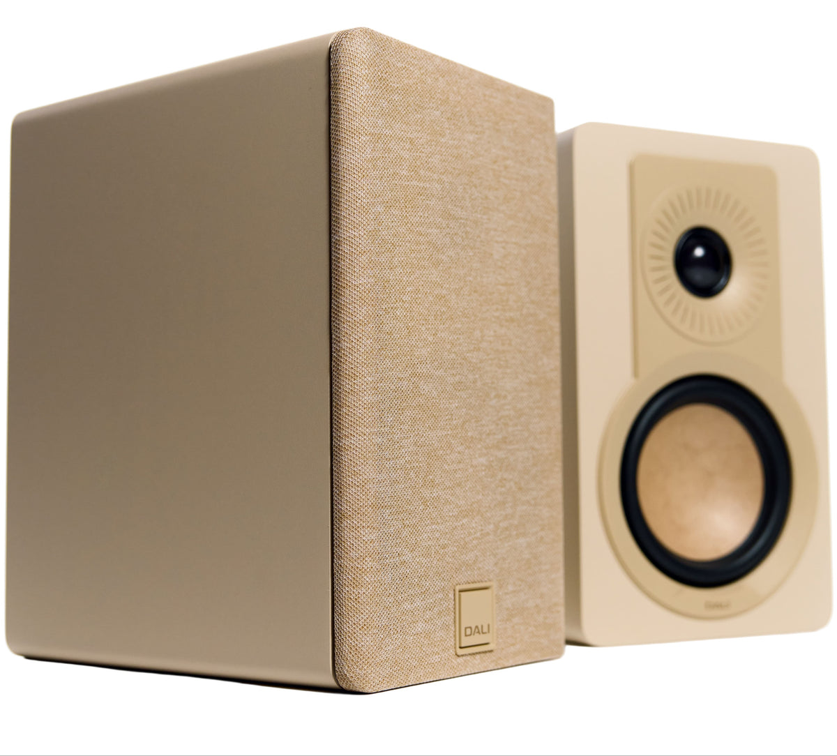 DALI Kupid passive bookshelf speakers in caramel white, showcasing sleek design and compact size for high-quality audio.