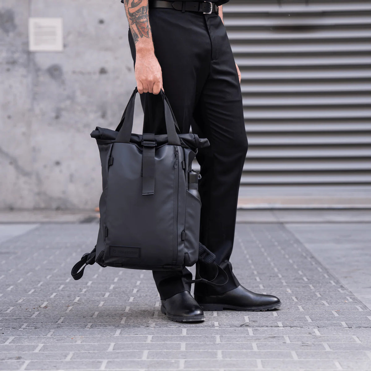Black Wandrd Prvke EDC 18L video equipment bag with durable exterior and compact design, ideal for photographers and videographers.