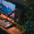 Adam Audio T8V active studio monitor, in black, lifestyle setting