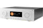 JBL MA7100HP stereo amplifier with sleek black design and control knobs, showcasing professional audio equipment.