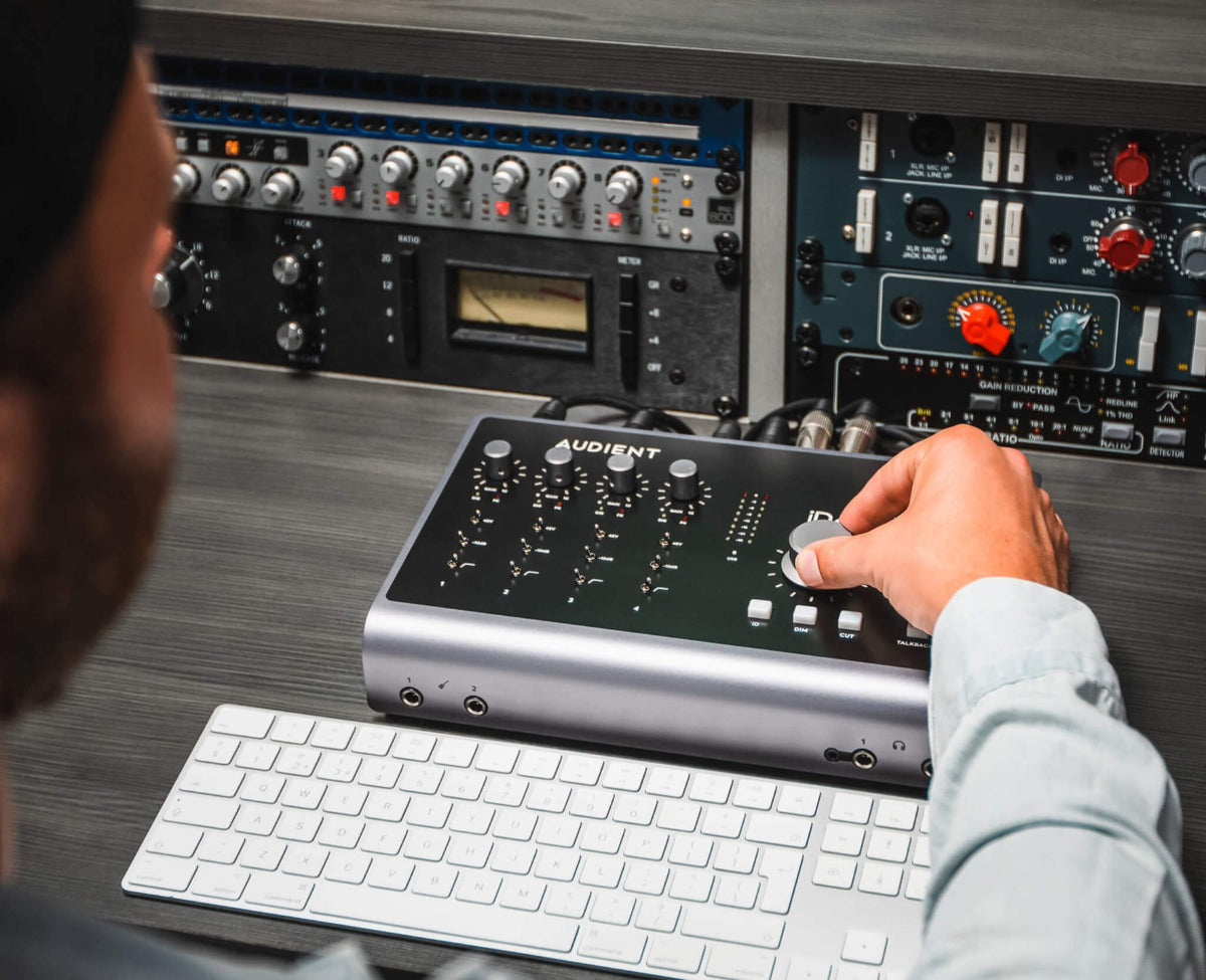 Audient iD44 MK2 audio interface with multiple input and output ports, sleek black design, and professional audio equipment features
